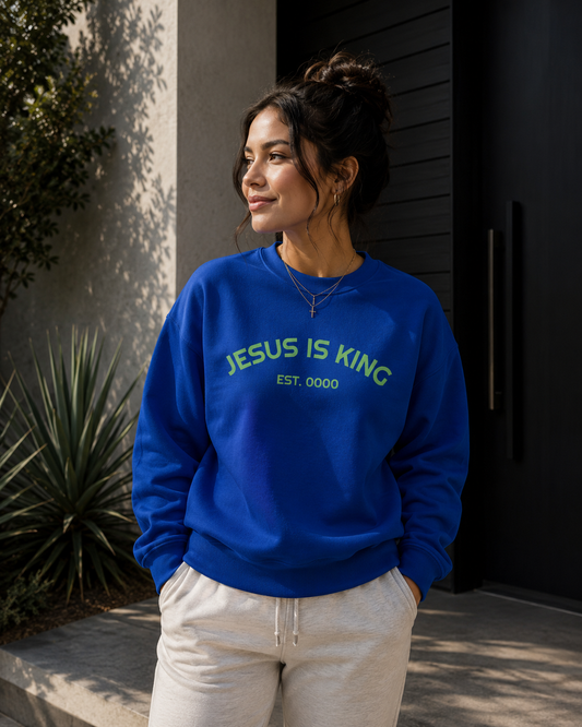 Female model wearing Daniel Haus Goods Jesus Is King sweatshirt, modern Christian apparel inspired by faith in Jesus Christ.